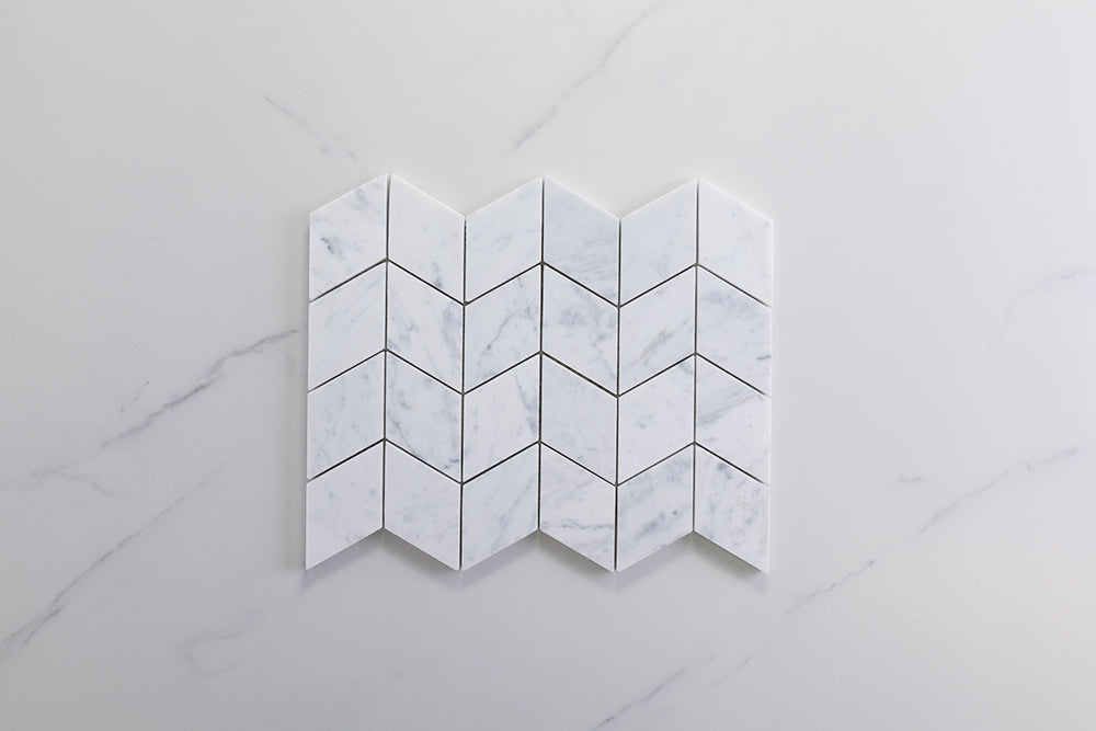 Deca White Carrara Honed Chevron Tile
