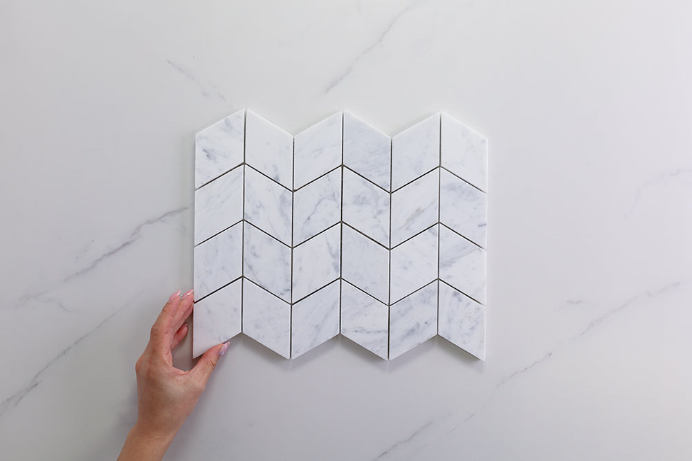 Deca White Carrara Honed Chevron Tile
