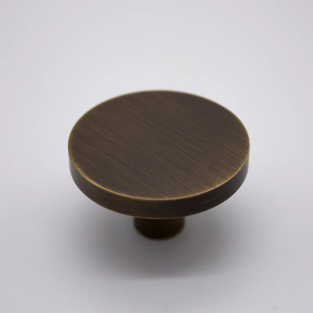 Manovella Round Profile Cabinet Knob - Olivia - Aged Brass